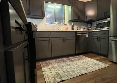 Kitchen with gray cabinets