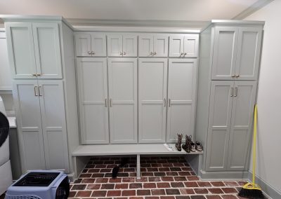Gray cabinets and bench.